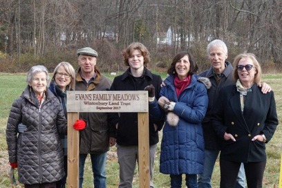 Photograph of Marguerite Evans, her daughter Dayle and husband Mike Williams, her son Donald Evans Jr. and wife Patricia, his daughter Deborah Quigley, and grandson Kaie Quigley