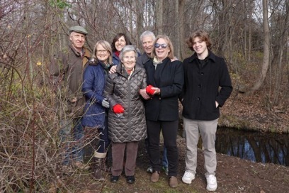 Photograph of Marguerite Evans, her daughter Dayle and husband Mike Williams, her son Donald Evans Jr. and wife Patricia, his daughter Deborah Quigley, and grandson Kaie Quigley