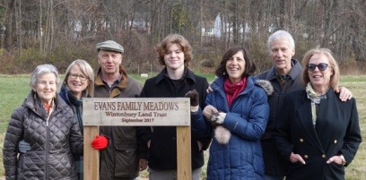 Photograph of Marguerite Evans, her daughter Dayle and husband Mike Williams, her son Donald Evans Jr. and wife Patricia, his daughter Deborah Quigley, and grandson Kaie Quigley